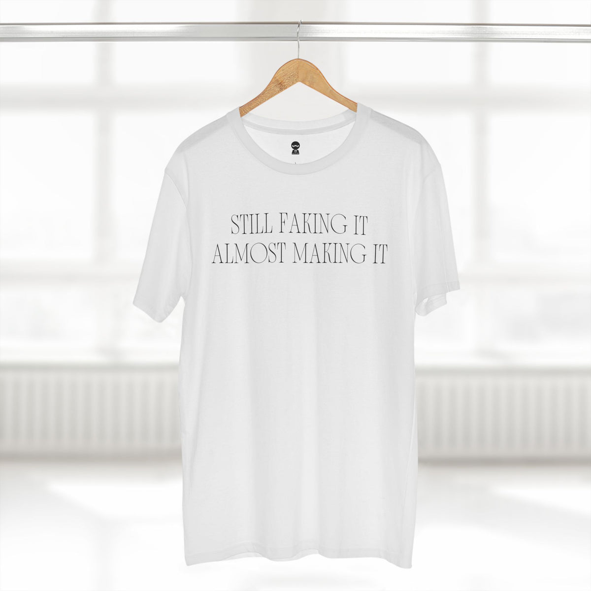 T-shirt printed with the Still Faking It design