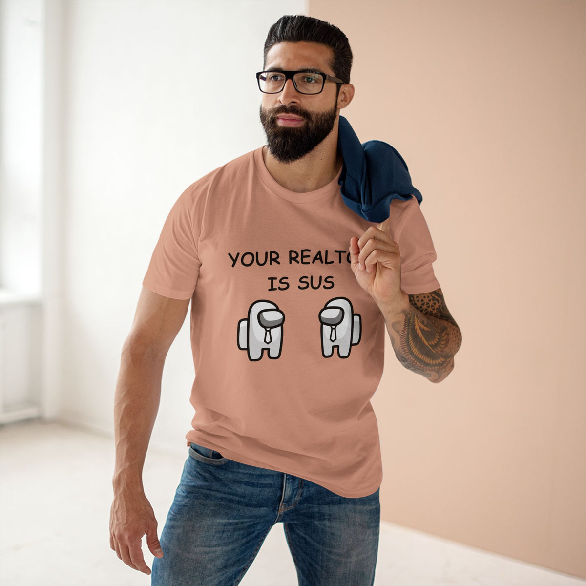 T-shirt printed with the Your Realtor Is Sus design