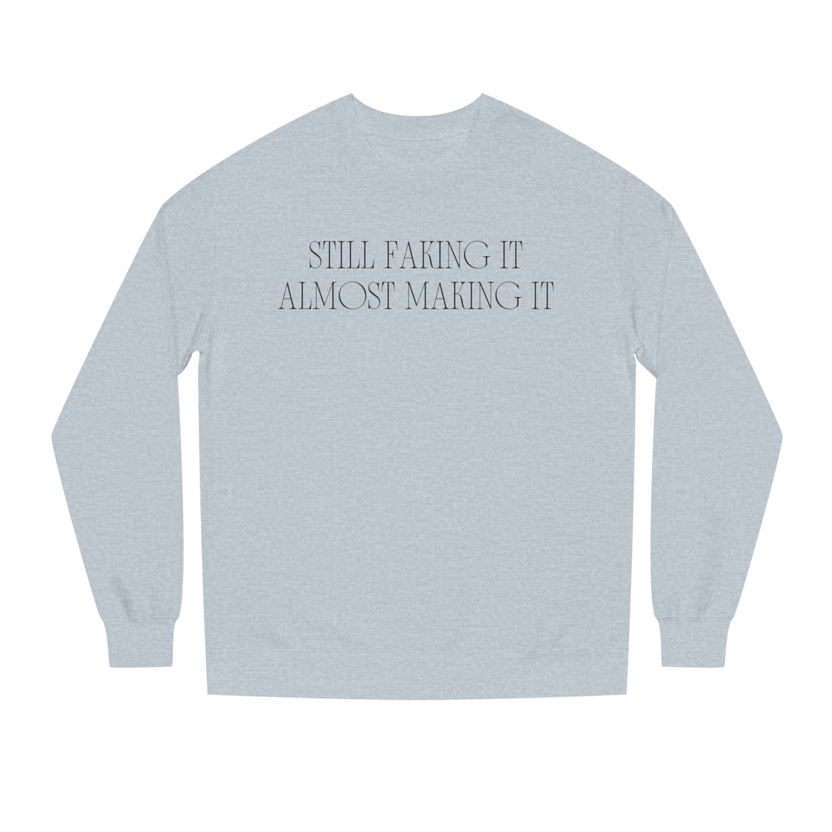 Grey Heather crewneck sweatshirt printed with the Still Faking It design