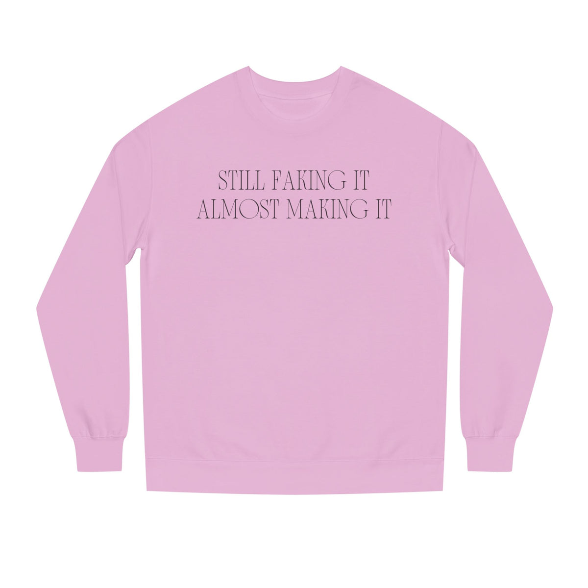 Light Pink crewneck sweatshirt printed with the Still Faking It design
